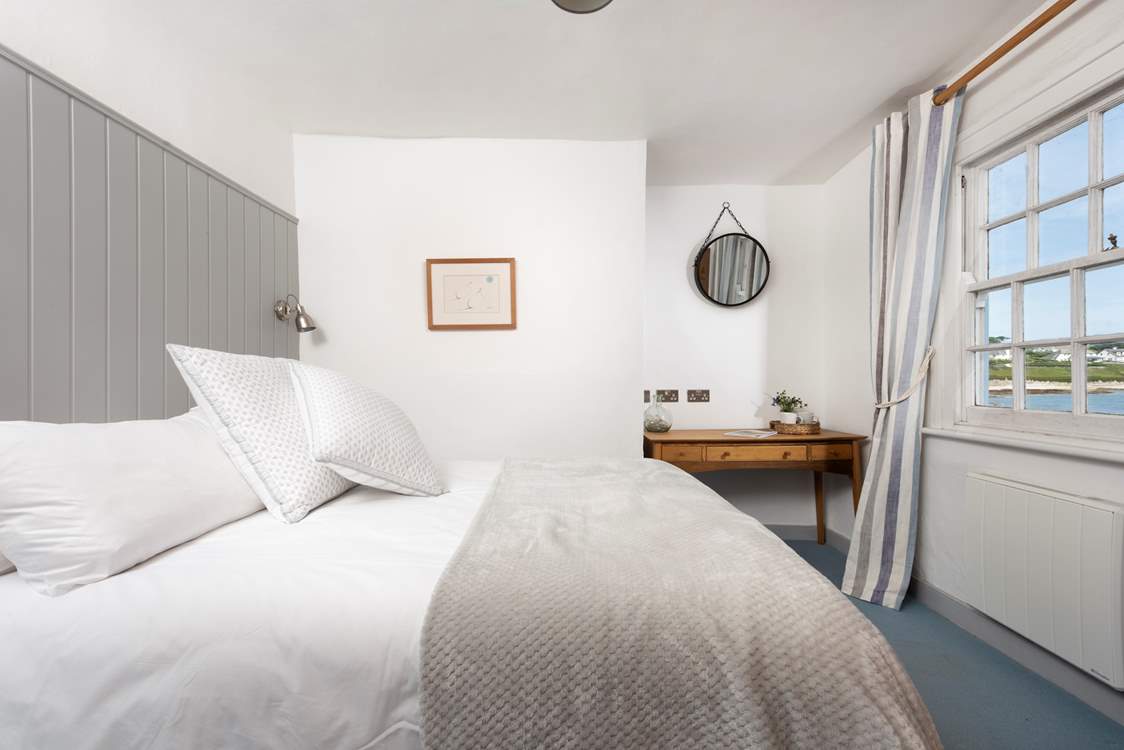 Listen to the tide ebb and flow from the double bedroom.