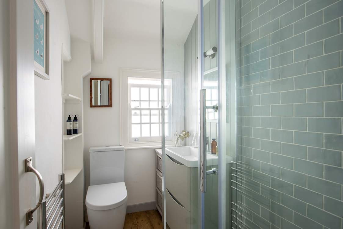 The shower-room makes creative use of the bijou space.