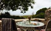 A private patio with a view for sunny breakfasts or dinner under the stars.  - Thumbnail Image