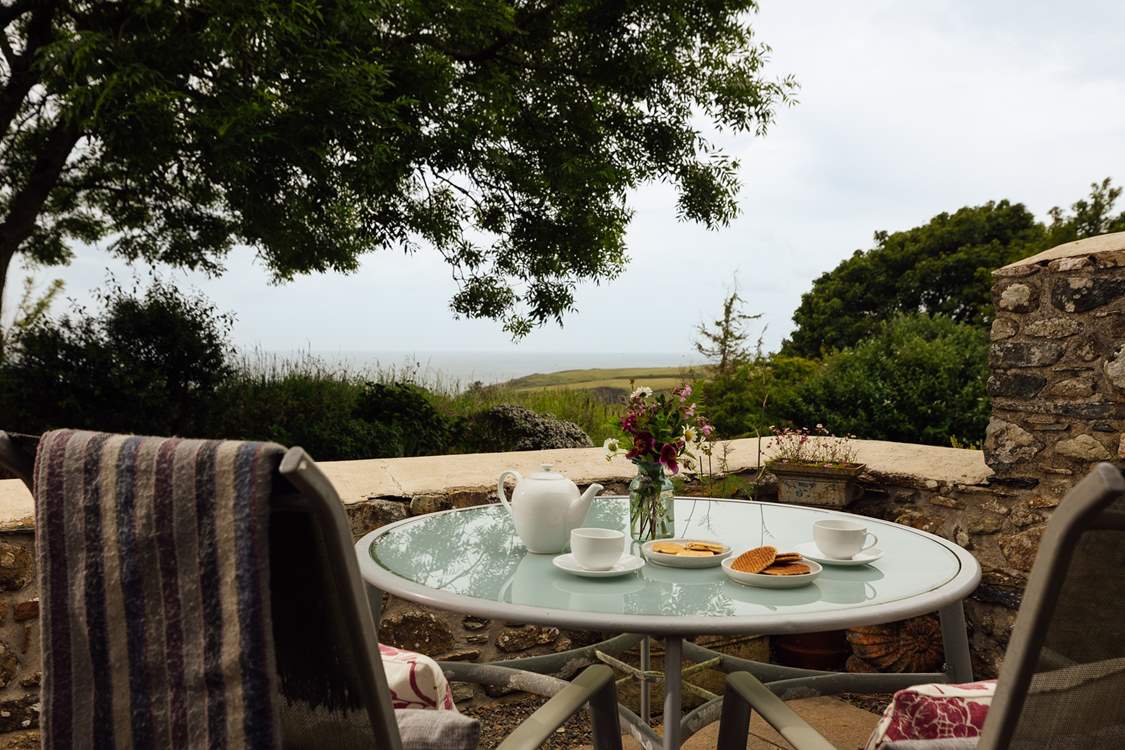 A private patio with a view for sunny breakfasts or dinner under the stars.