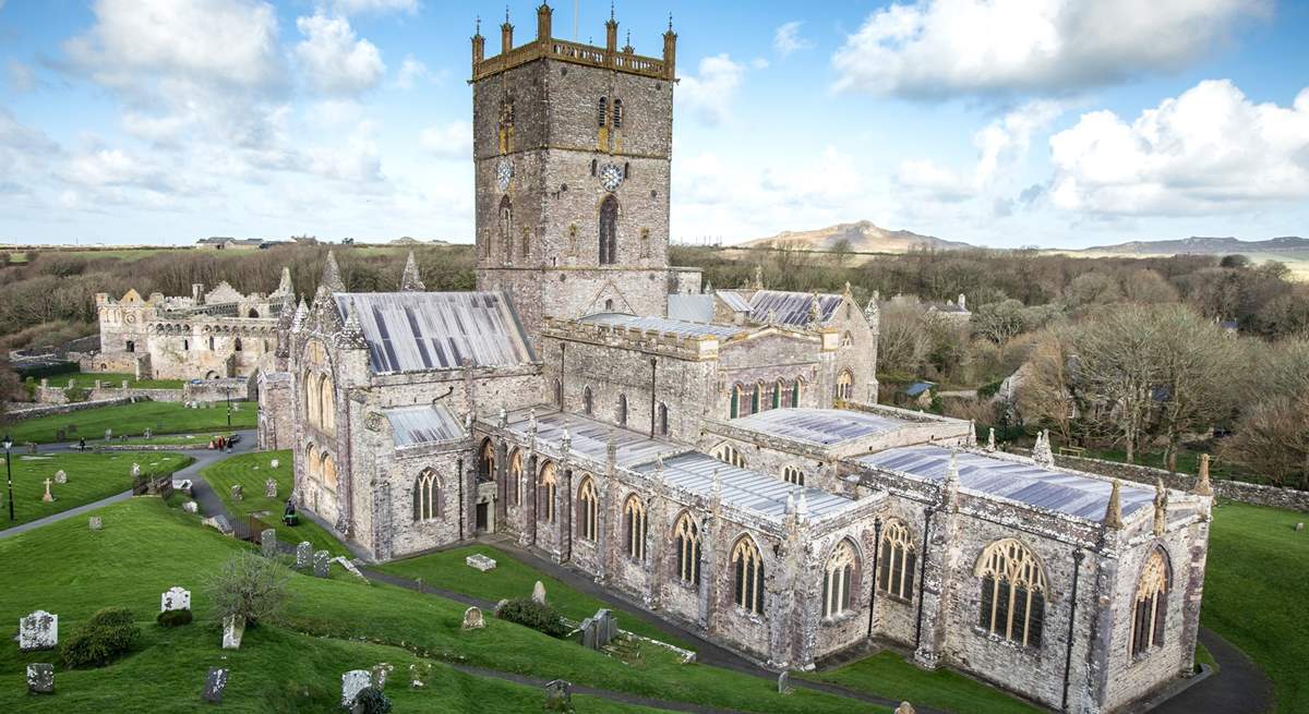 Enchanting St Davids' Cathedral.Take lunch in the Refectory Cafe. Nearby is glorious Whitesands Beach and the picturesque harbour village of Solva, with good eateries and boutique shops to browse. 