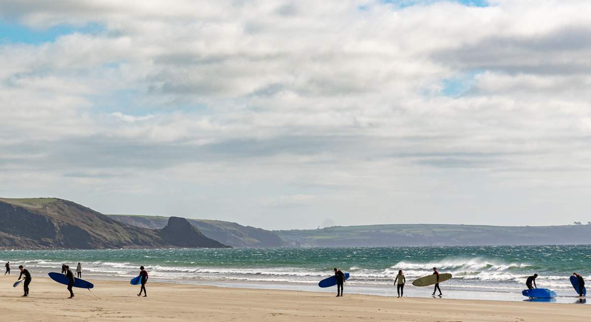 The long stretch of golden sands and rolling surf at Newgale. 