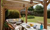 The impressive patio terrace is ready for you to indulge in al fresco dining. - Thumbnail Image