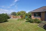 The enclosed rear garden offers a stunning outdoor retreat.
