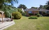 The well-kept garden offers a peaceful oasis.  - Thumbnail Image
