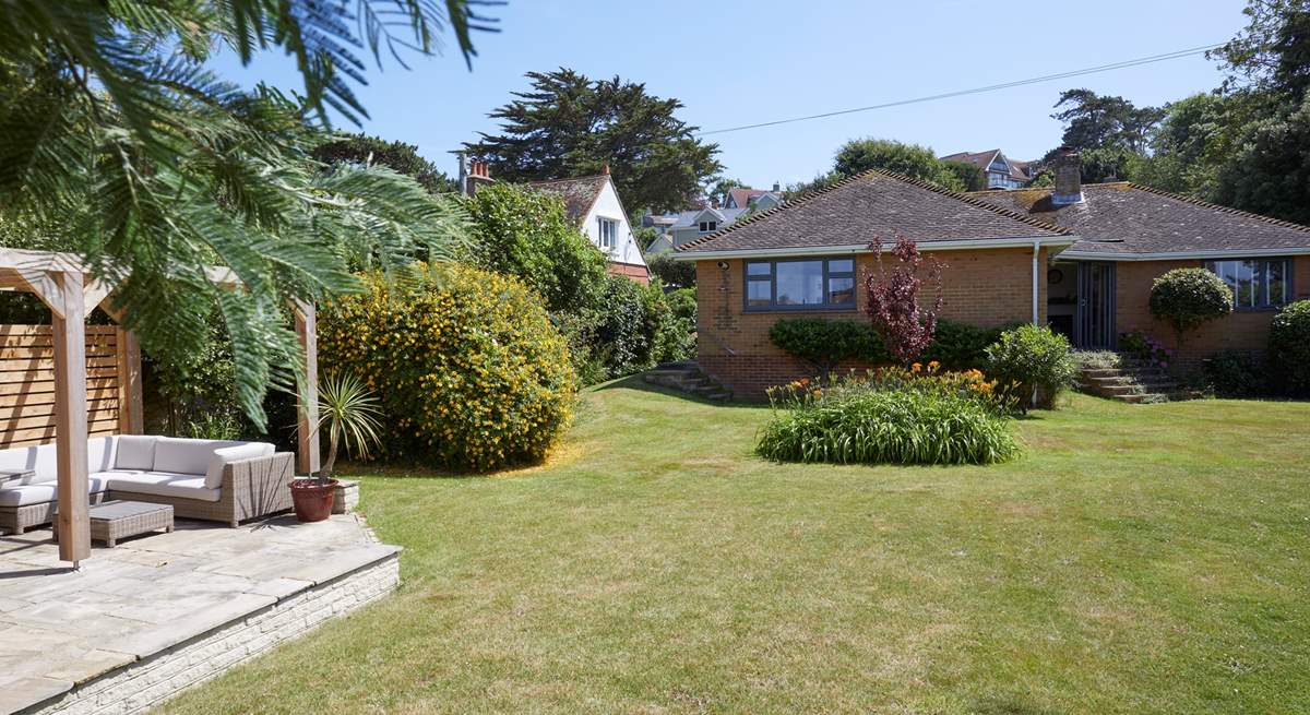 The well-kept garden offers a peaceful oasis. 