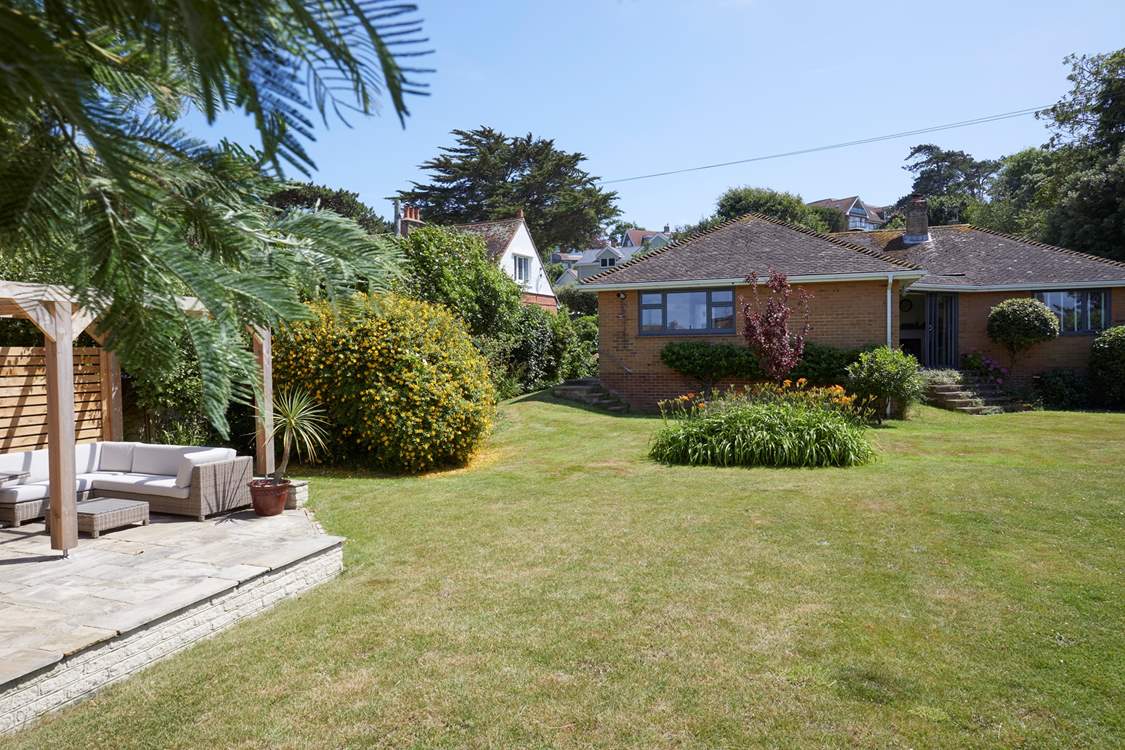 The well-kept garden offers a peaceful oasis.