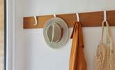 A porch offers a handy space to accommodate your coats and footwear. - Thumbnail Image