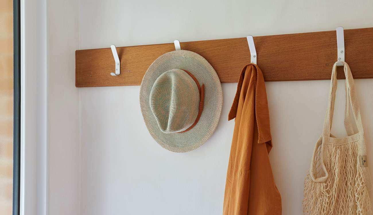 A porch offers a handy space to accommodate your coats and footwear.