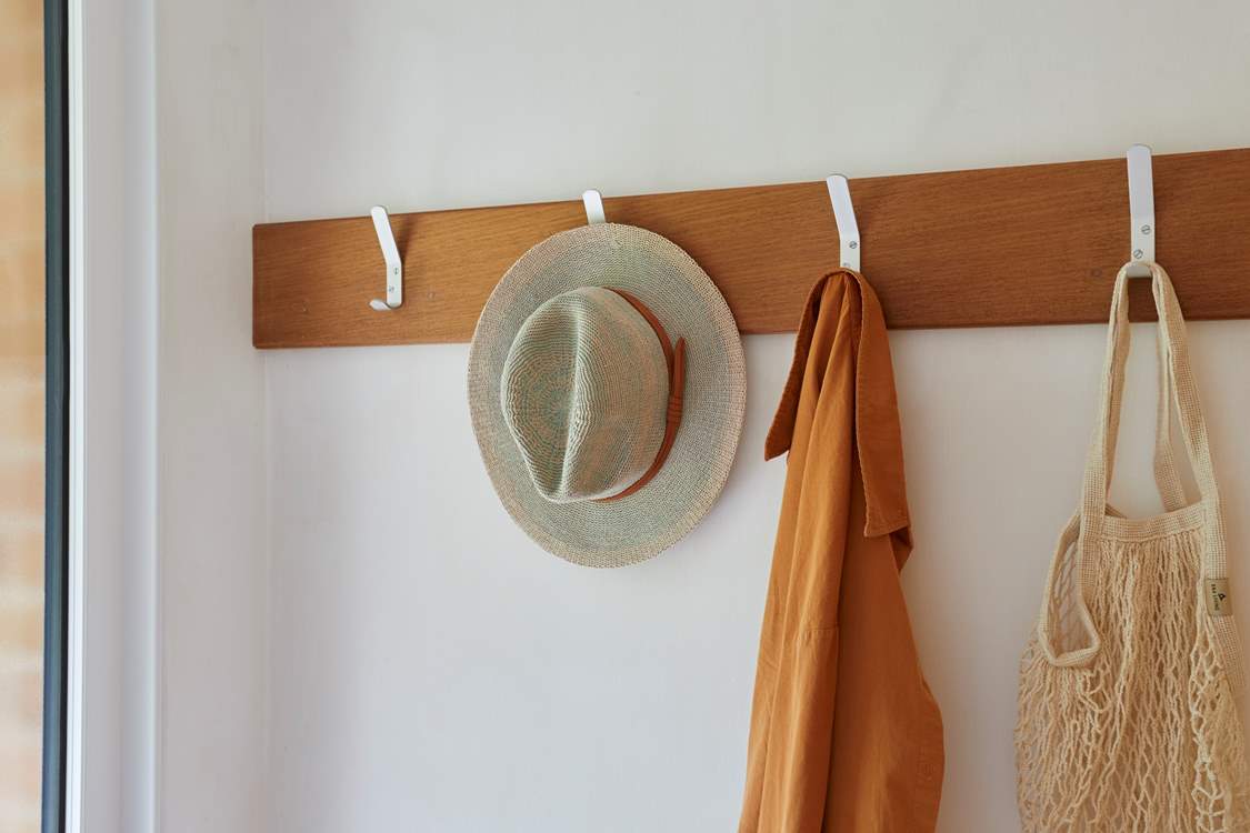 A porch offers a handy space to accommodate your coats and footwear.