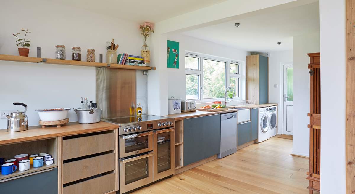 The modern-rustic kitchen offers the perfect blend of practicality and style.