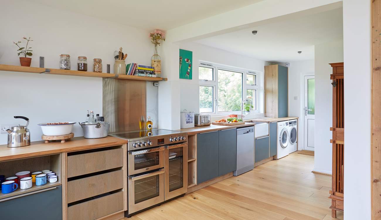 The modern-rustic kitchen offers the perfect blend of practicality and style.