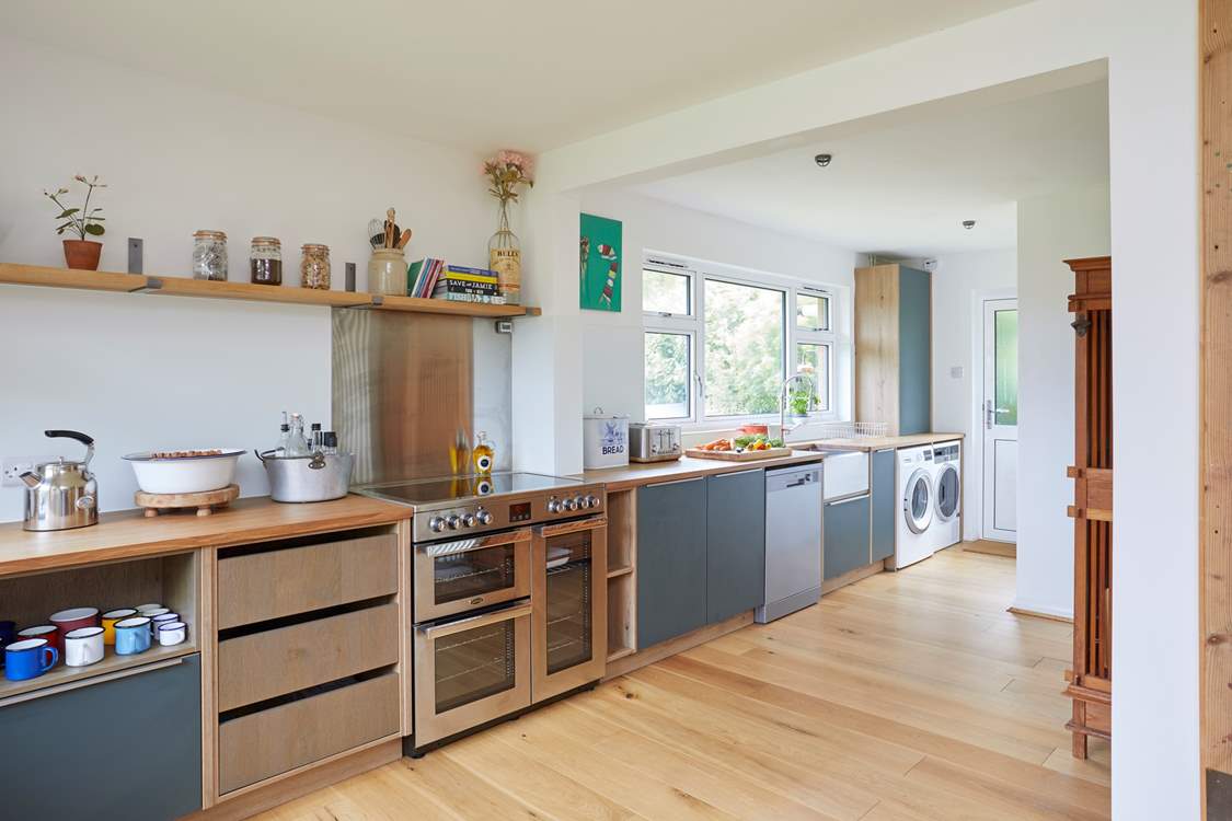 The modern-rustic kitchen offers the perfect blend of practicality and style.