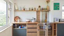 The range oven and thoughtful details make this space a pleasure for the chef!
