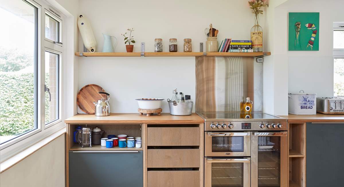 The range oven and thoughtful details make this space a pleasure for the chef!