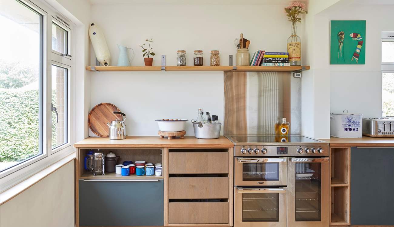 The range oven and thoughtful details make this space a pleasure for the chef!