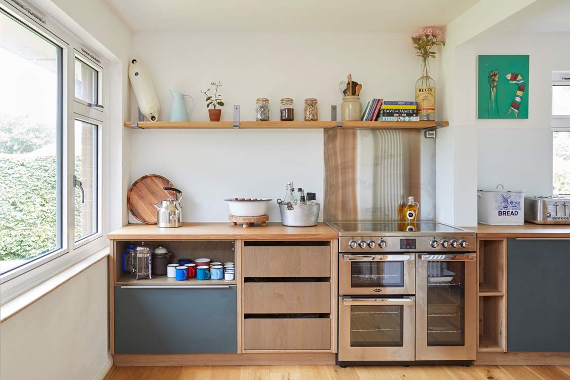The range oven and thoughtful details make this space a pleasure for the chef!