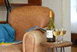Relax and enjoy a little tipple and a good book.