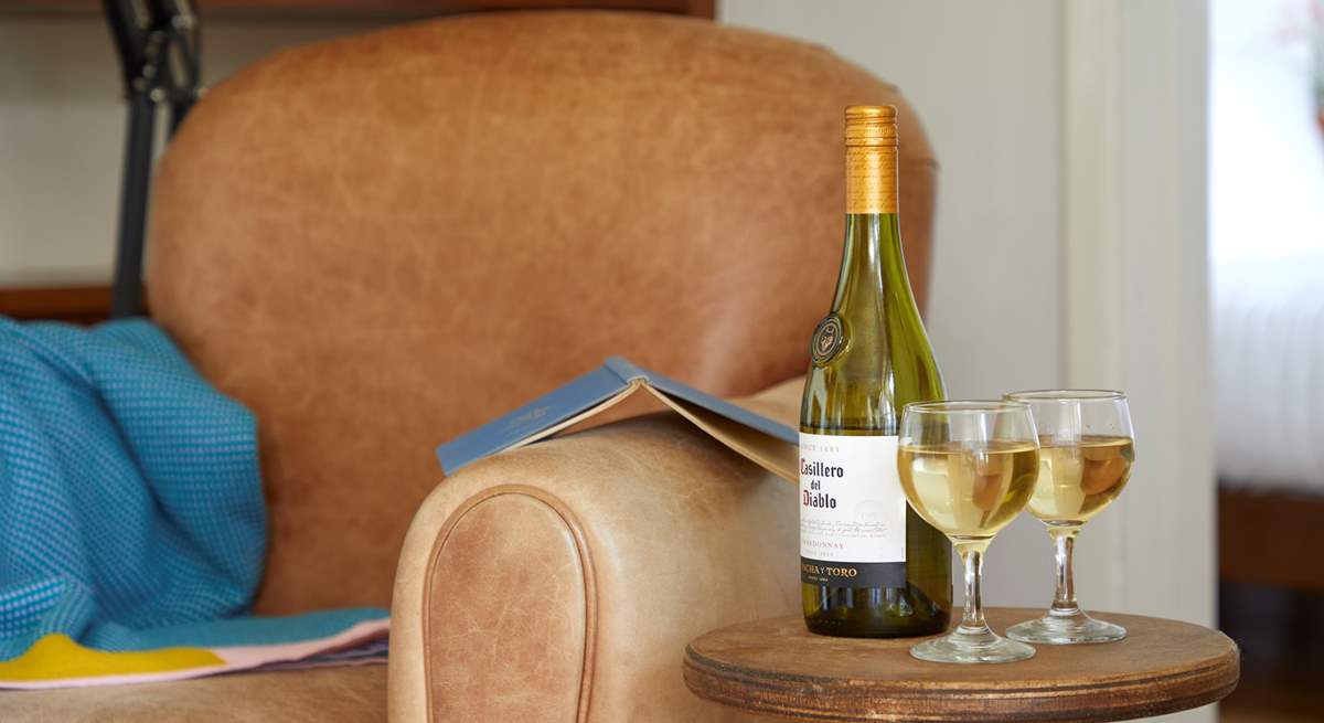 Relax and enjoy a little tipple and a good book.