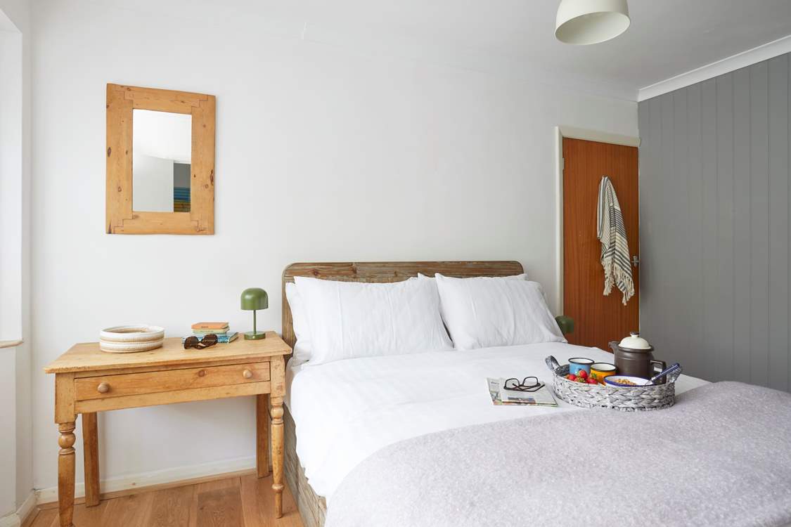 A restful night awaits in bedroom 1.