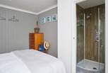 Bedroom 1 boasts a stylish en suite shower-room. 