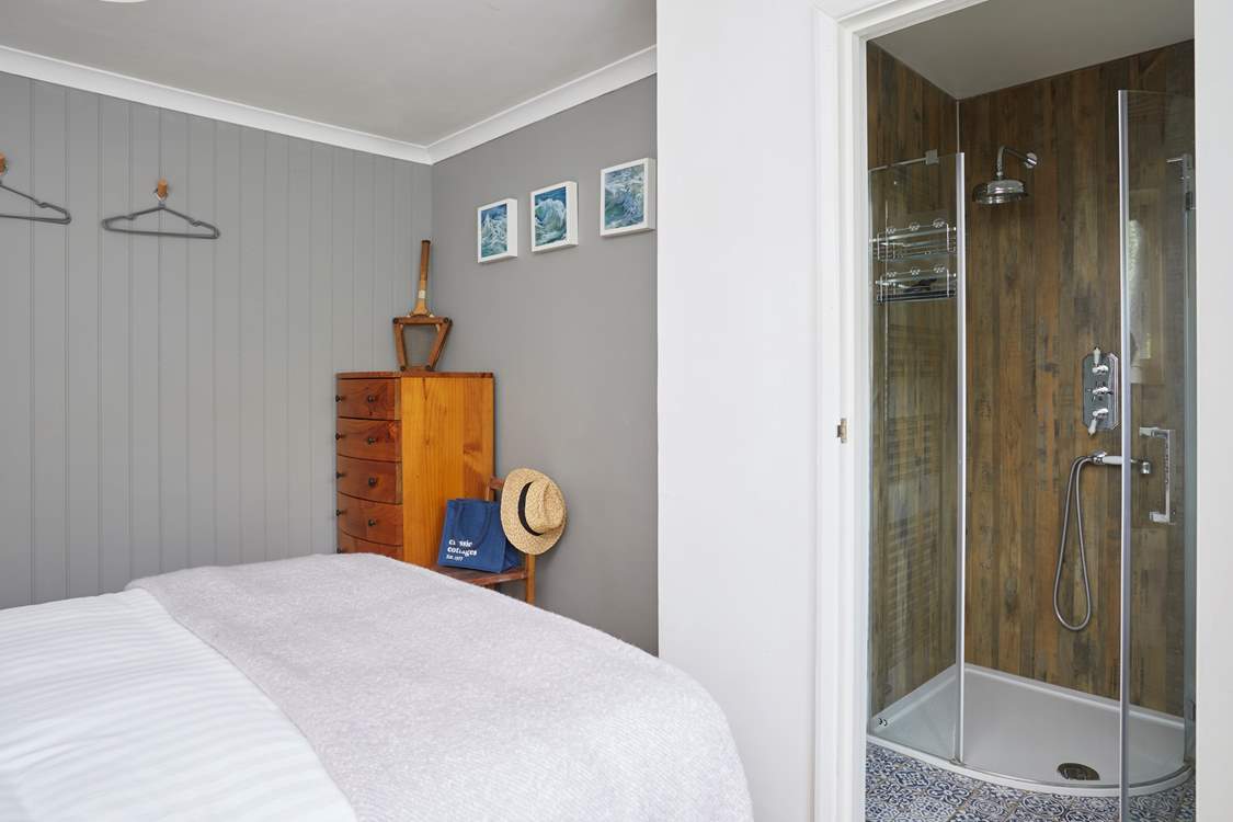 Bedroom 1 boasts a stylish en suite shower-room.