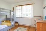 Bedroom 2 with bunk-beds offers a fun space for the children.