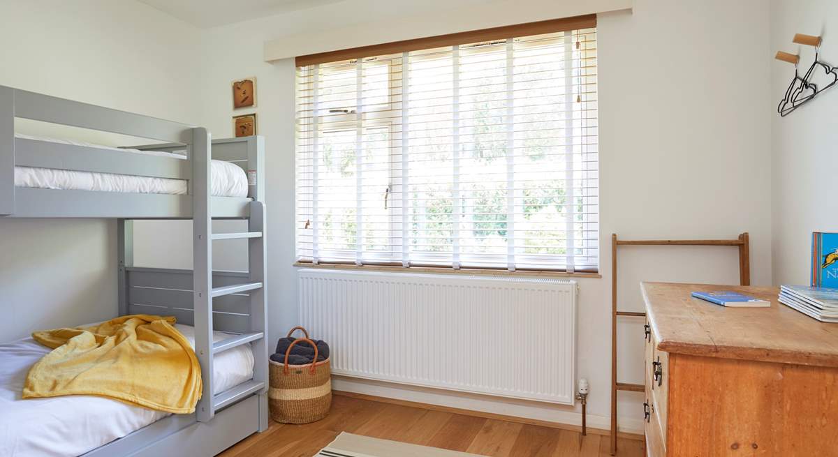 Bedroom 2 with bunk-beds offers a fun space for the children.