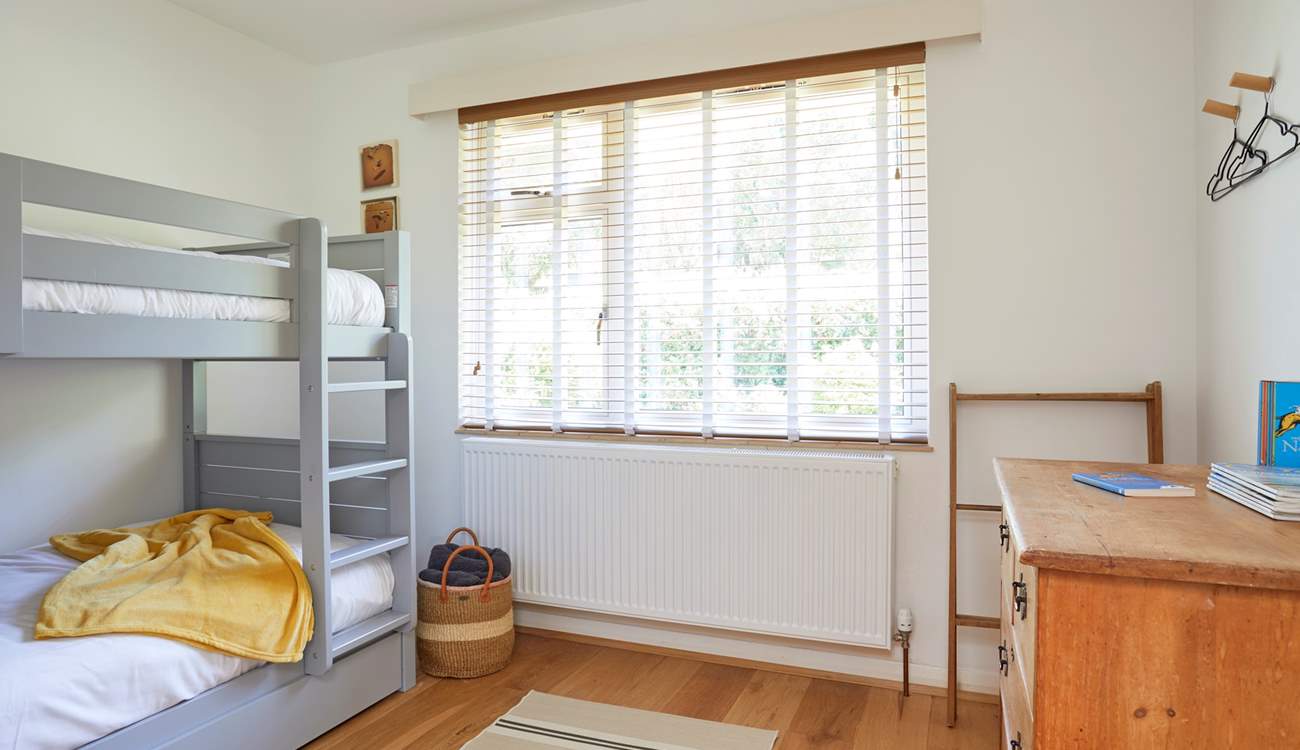 Bedroom 2 with bunk-beds offers a fun space for the children.