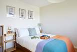 A restful double bedroom, tucked away from the living space.