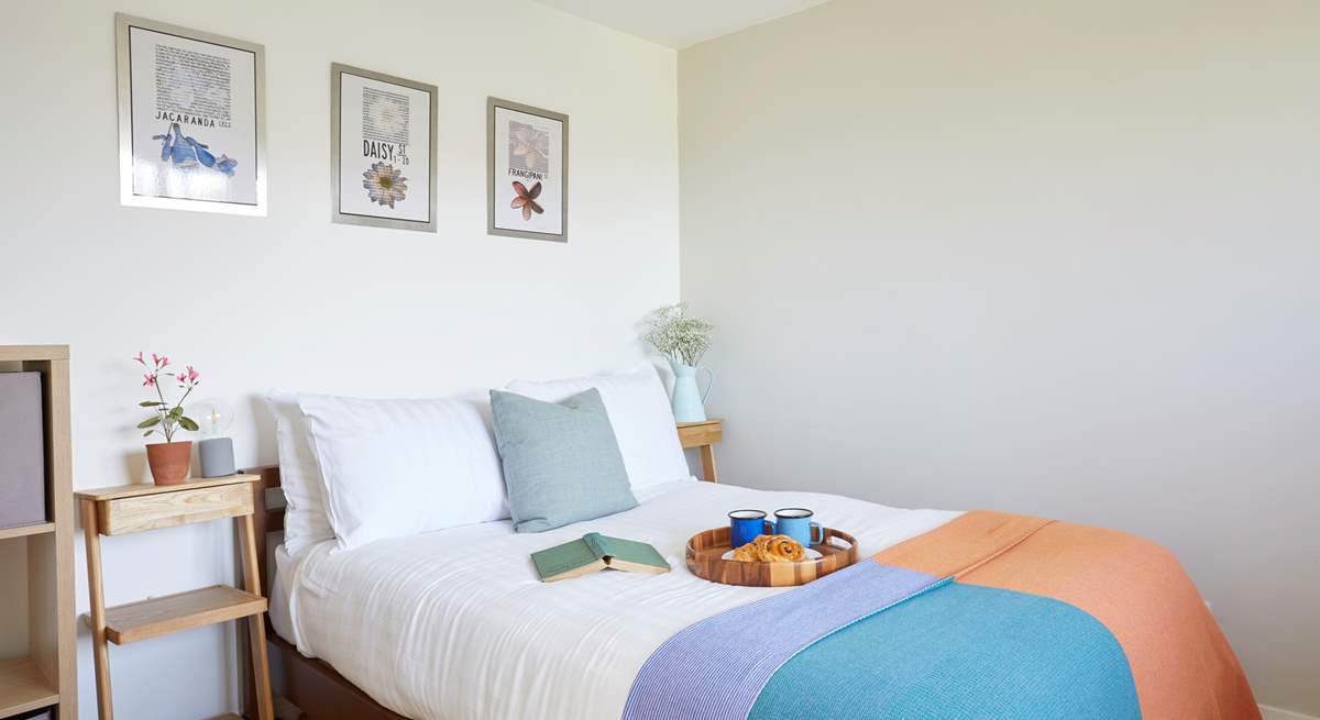 A restful double bedroom, tucked away from the living space.