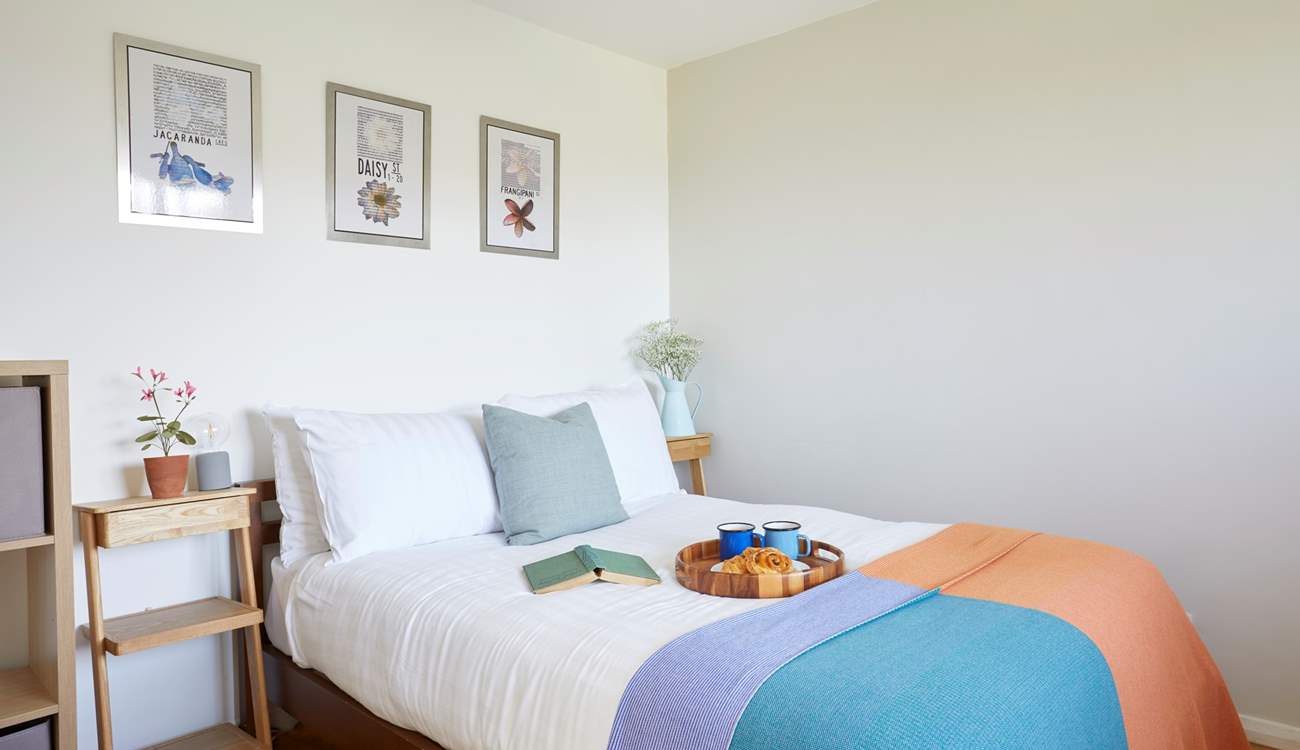 A restful double bedroom, tucked away from the living space.