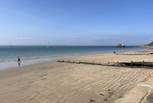 The golden sands and turquoise waters at Totland Bay are just a short stroll away!