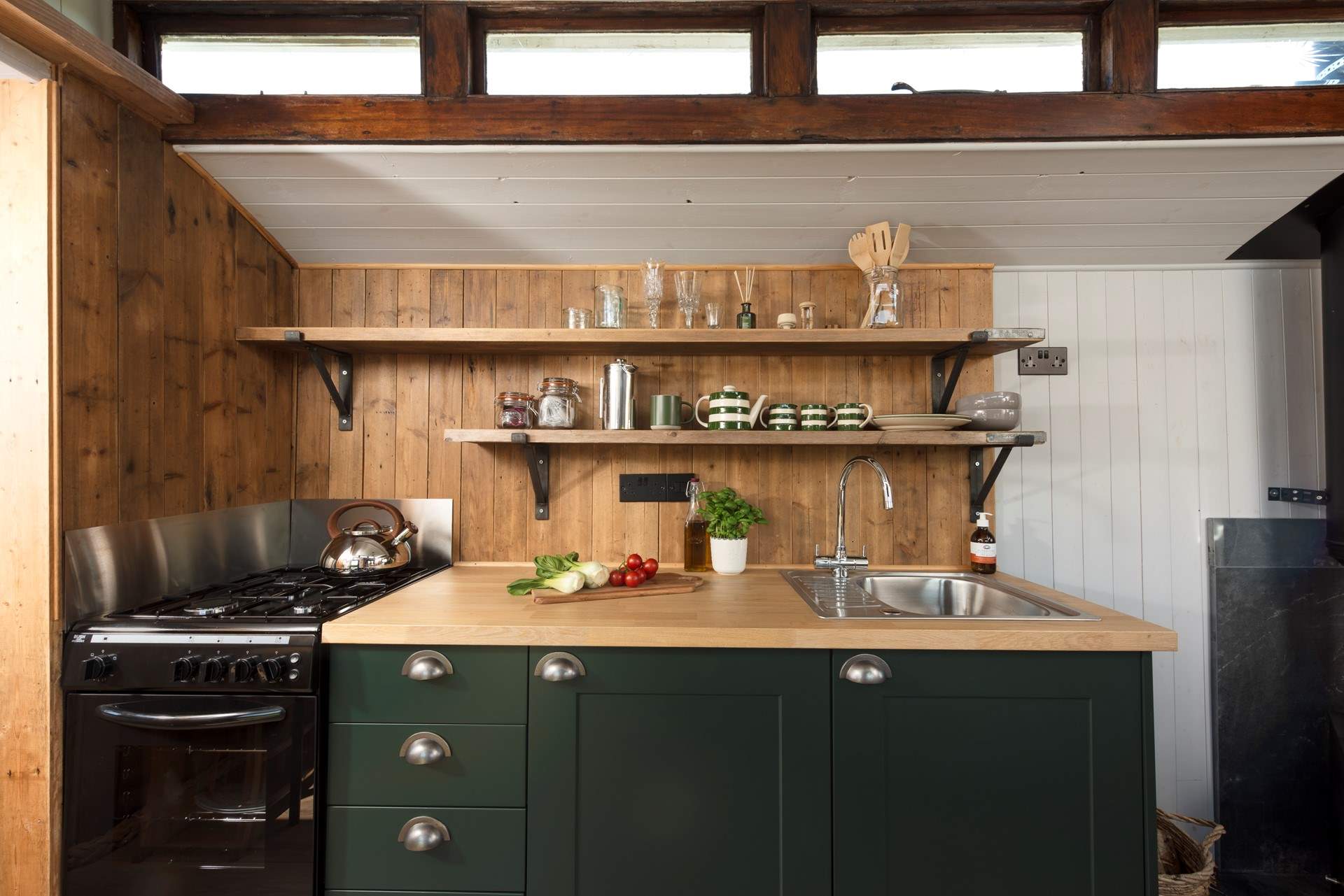 The sleek and stylish kitchen is well-equipped with everything you'll need during your stay. 