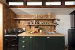The sleek and stylish kitchen is well-equipped with everything you'll need during your stay. 