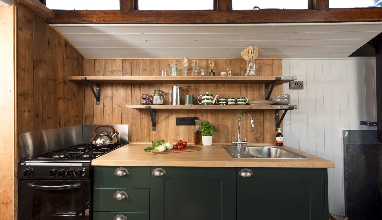 The sleek and stylish kitchen is well-equipped with everything you'll need during your stay. 