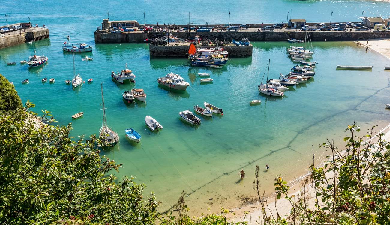 Visit Newquay for the bustling town and miles of sandy beaches.