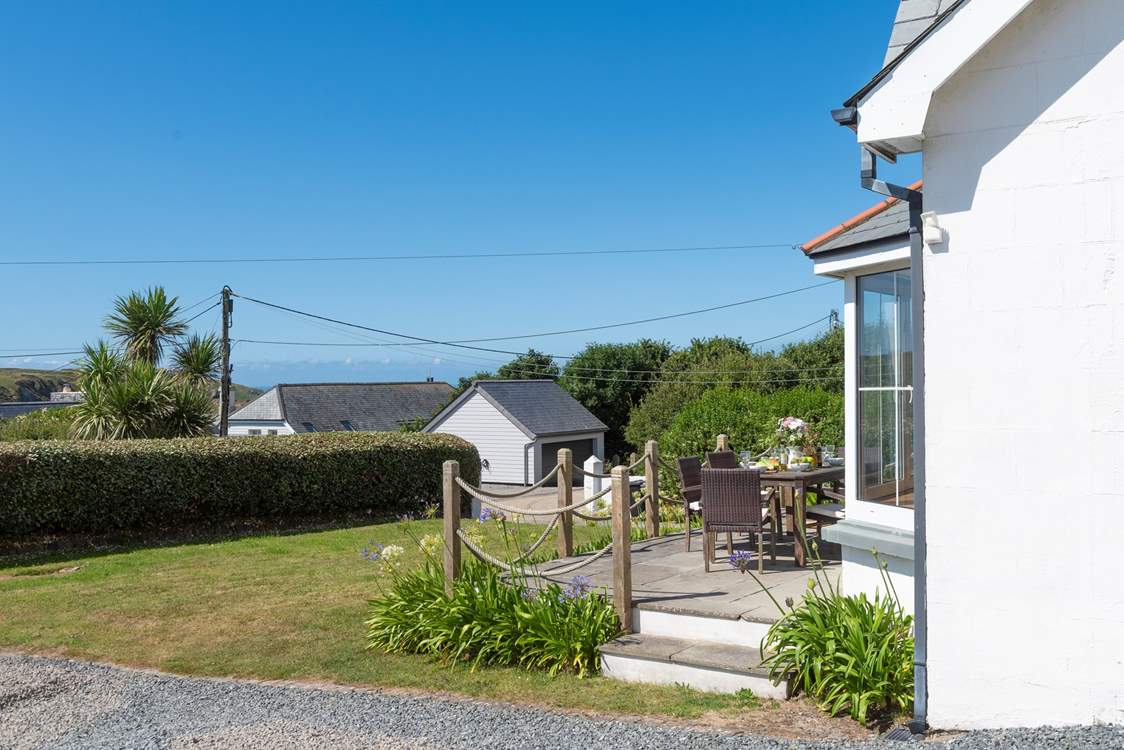 The front patio and garden is a lovely space for your loved ones to enjoy.