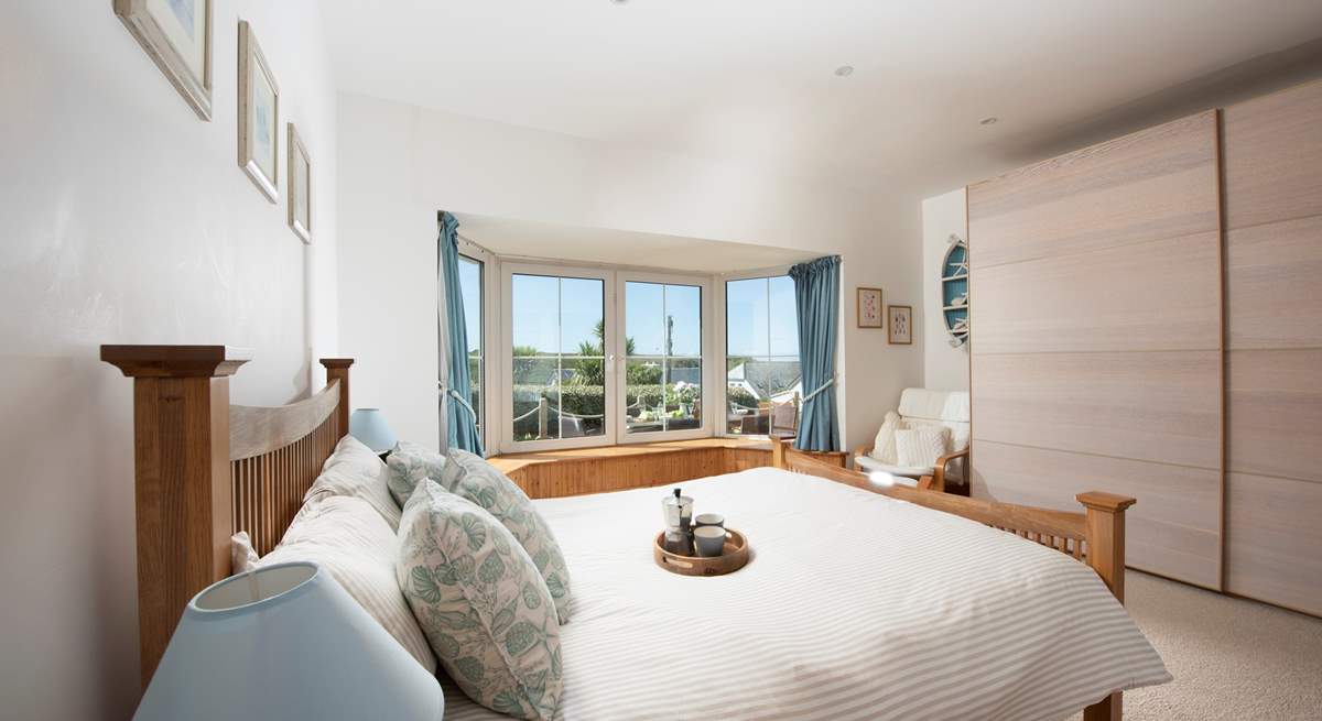 Bedroom 2 boasts a gorgeous bay window.