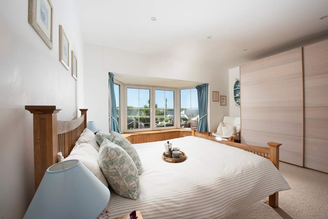 Bedroom 2 boasts a gorgeous bay window.