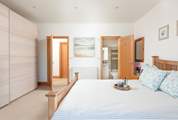Bedroom 2 is on the ground floor and has its own en suite.
