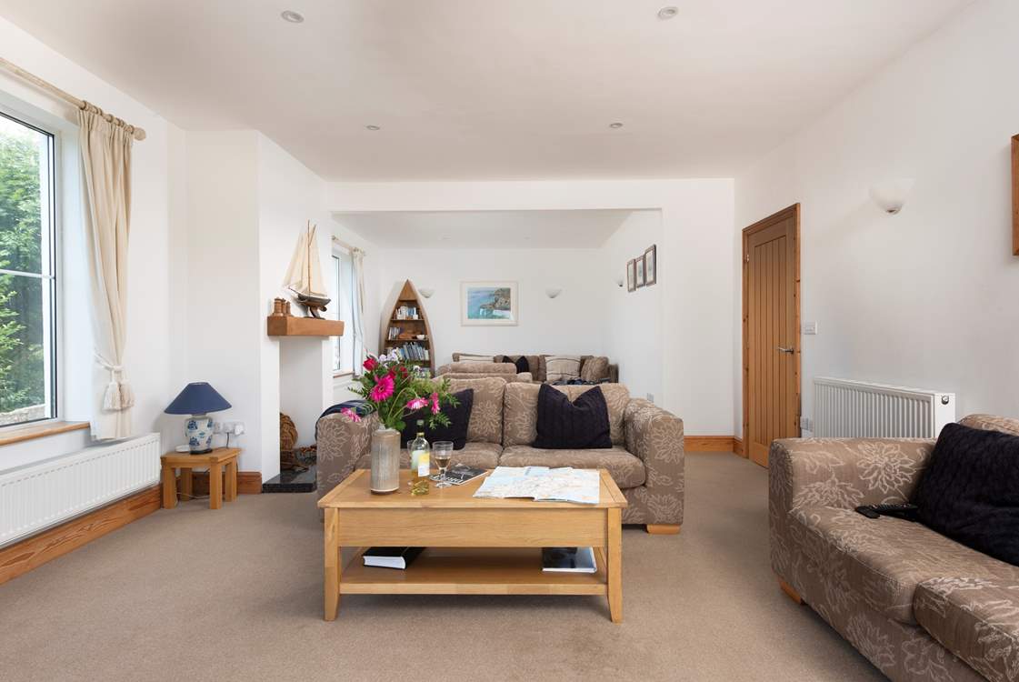 The sitting-room has two areas, one for games and one for relaxing!