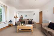 The sitting-room has two areas, one for games and one for relaxing!