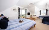 Super spacious, with a single bed for little ones, or casual sleeping. - Thumbnail Image