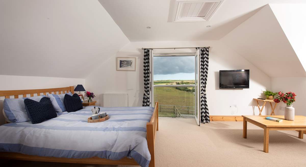 Bedroom 3 is on the first floor and has a Juliet balcony and valley views.