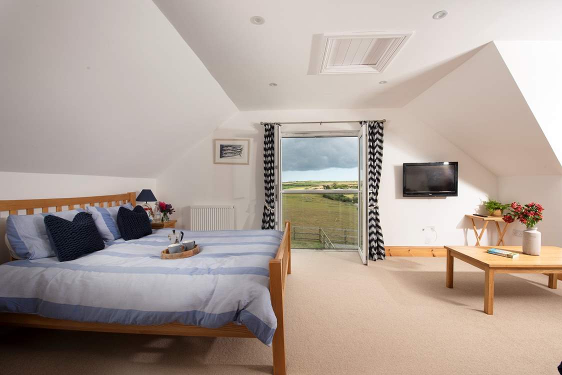 Bedroom 3 is on the first floor and has a Juliet balcony and valley views.