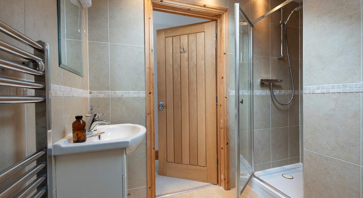 The modern en suite shower-room to bedroom 3.