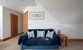 Snuggle up on the sofa in bedroom 4 and catch up on some holiday reading.  - Thumbnail Image