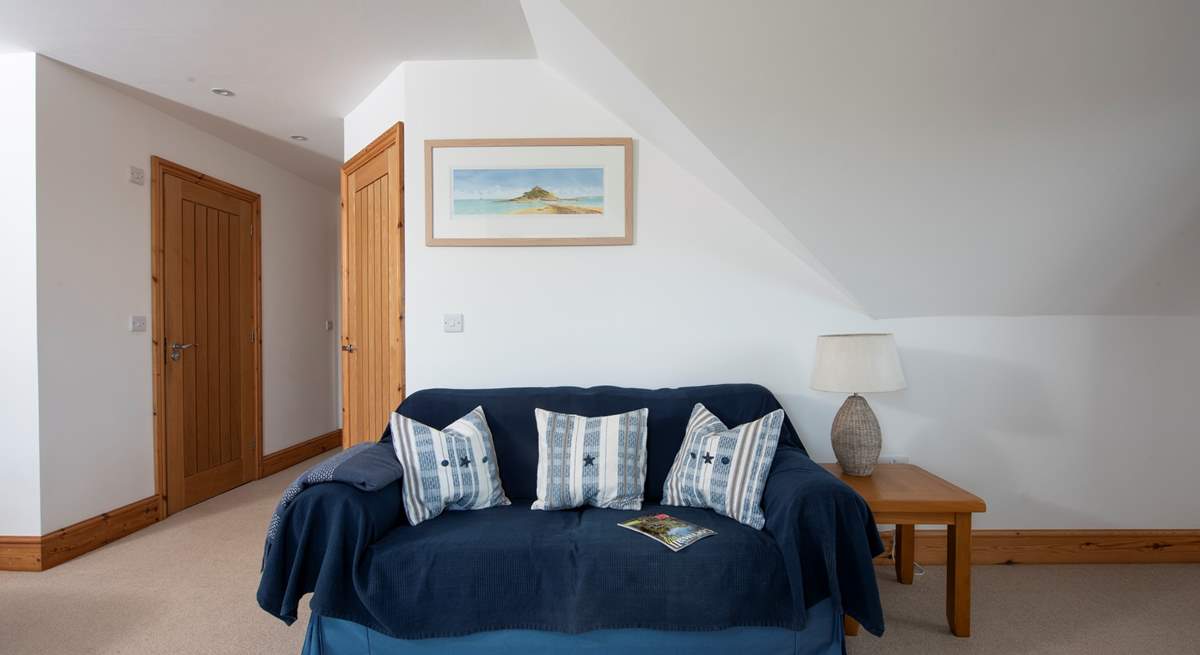 Snuggle up on the sofa in bedroom 4 and catch up on some holiday reading. 