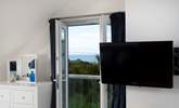 Glimpse the ocean from bedroom 4. - Thumbnail Image